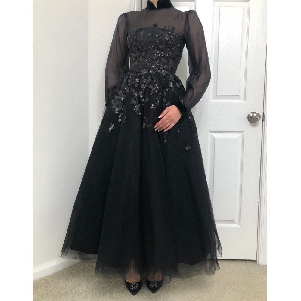 Ankle length evening gown. Black sequin corset top.